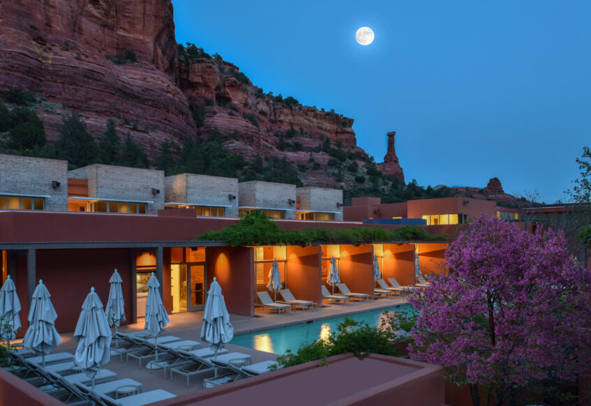 Mii amo pool with full moon over red rocks