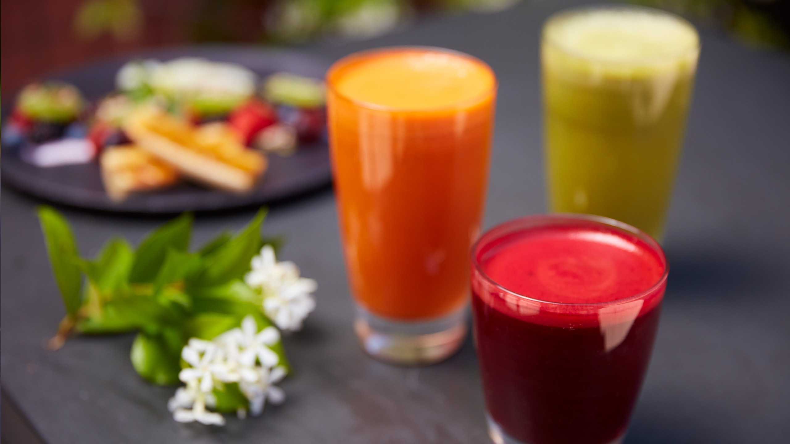 colorful juices and white flowers