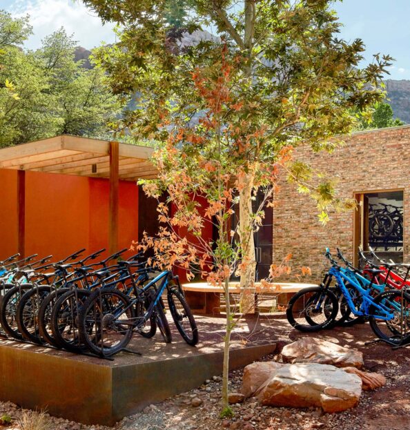 Exterior view of the Trail House with multiple mountain bikes featured on the patio