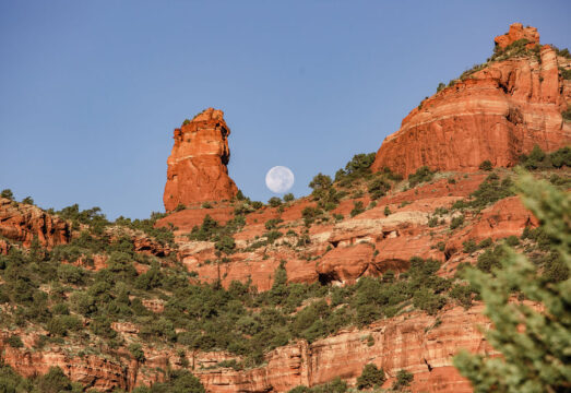 moon rising over red rocks in Sedona