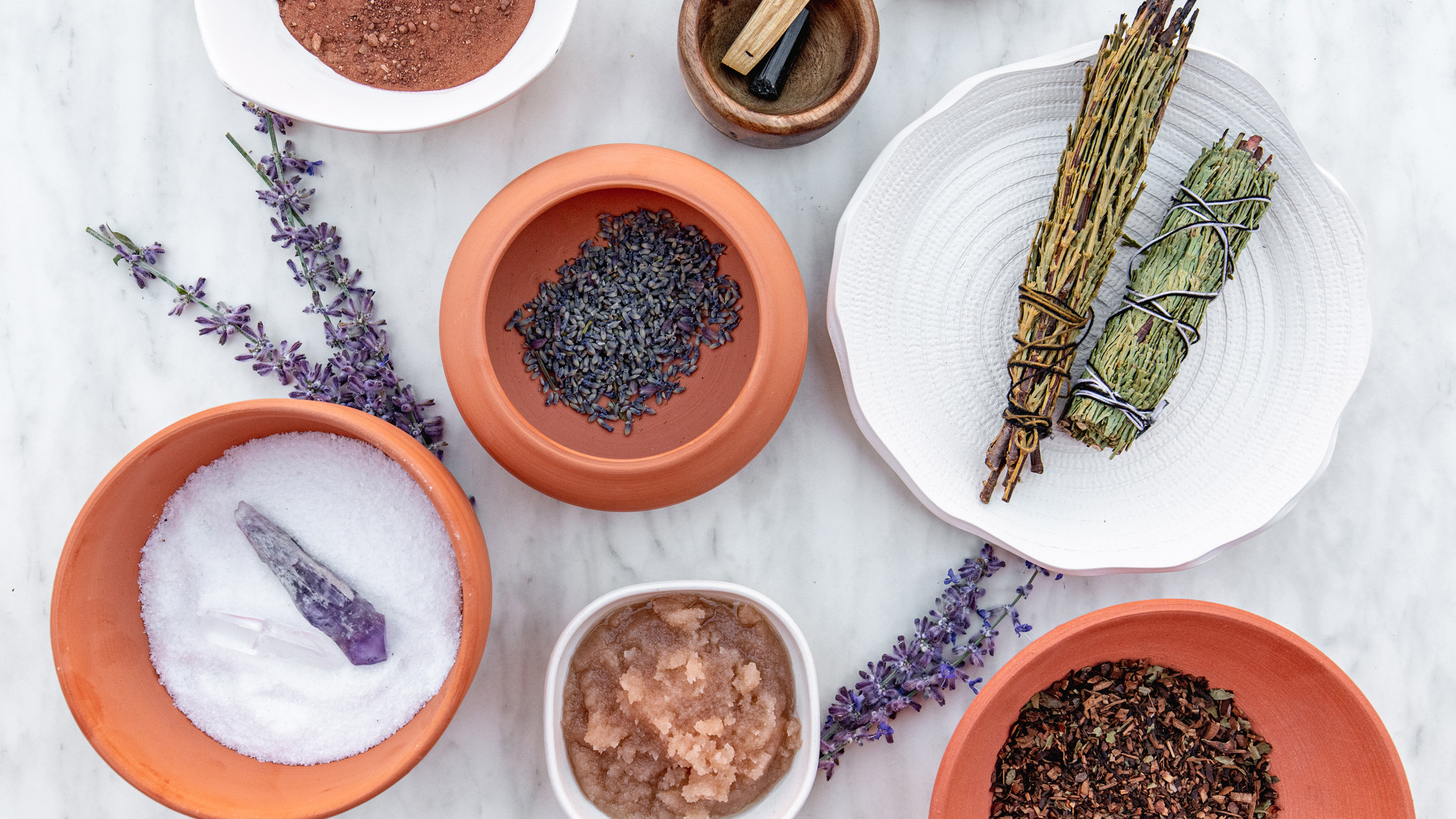 sprigs of lavender, sage bundle, terra cotta bowls
